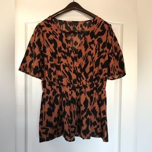 Ruffle Animal Print Peplum Blouse